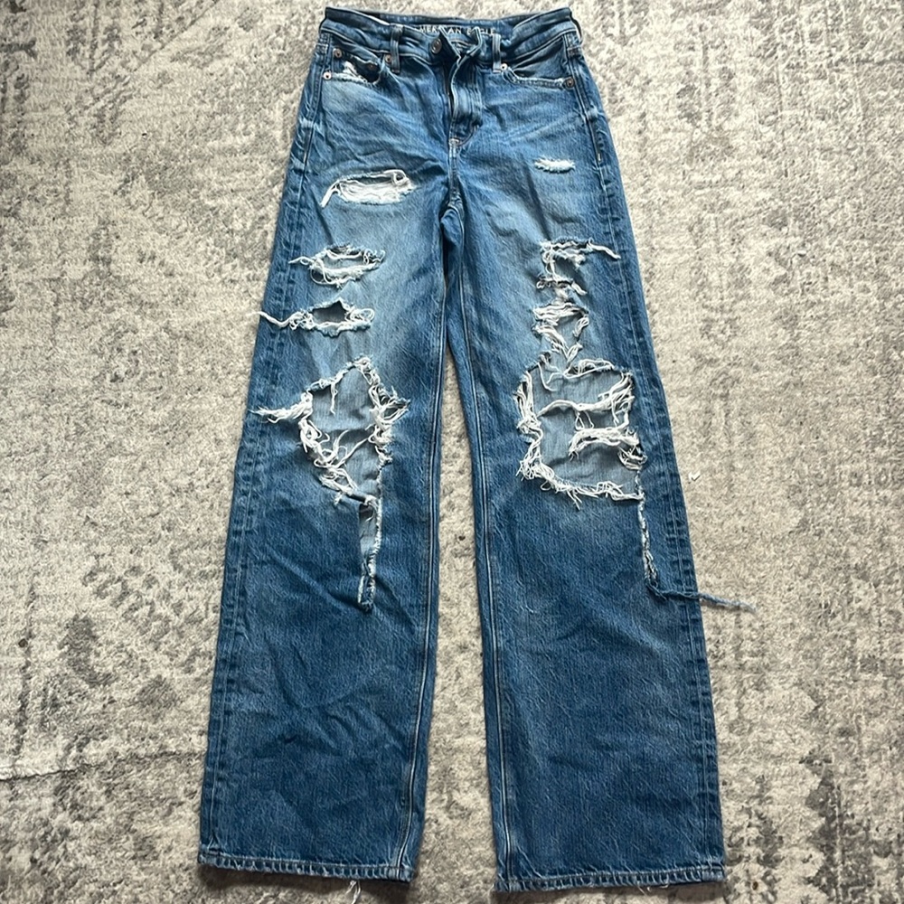 Dark blue wash wide leg, medium rise ripped Jeans